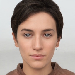 Neutral white young-adult female with short  brown hair and brown eyes