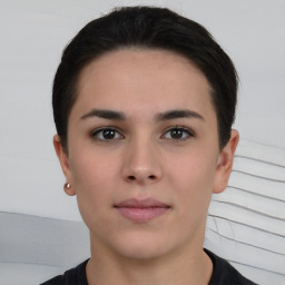 Neutral white young-adult female with short  brown hair and brown eyes