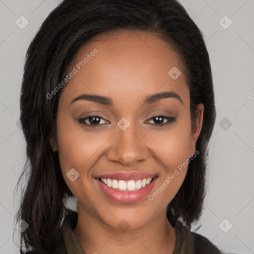 Joyful latino young-adult female with long  brown hair and brown eyes