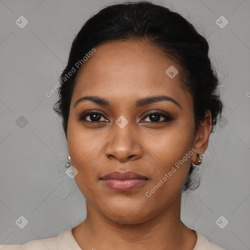 Joyful black young-adult female with medium  black hair and brown eyes