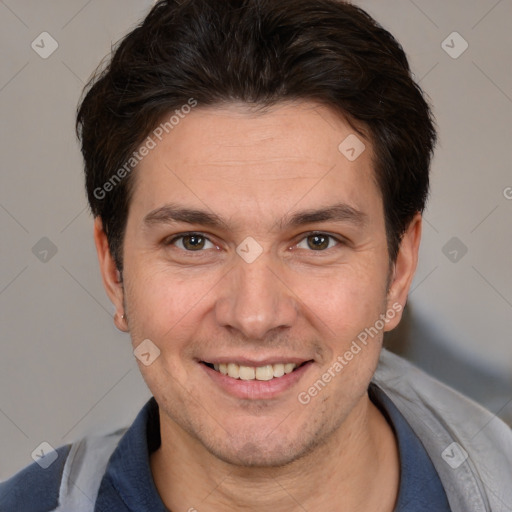 Joyful white adult male with short  brown hair and brown eyes