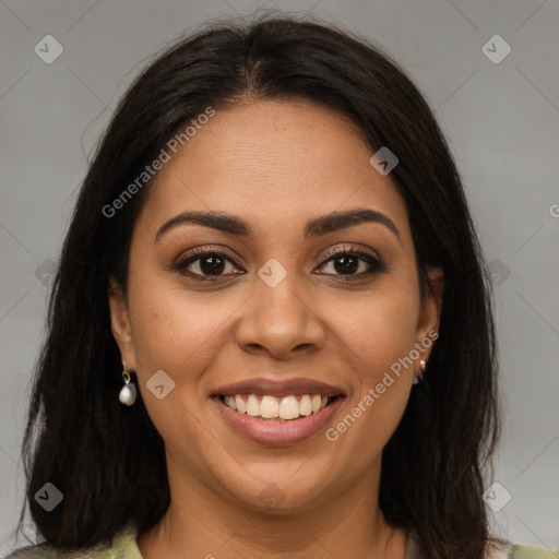 Joyful latino young-adult female with long  brown hair and brown eyes