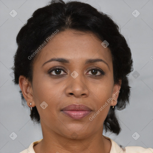 Joyful black adult female with short  brown hair and brown eyes