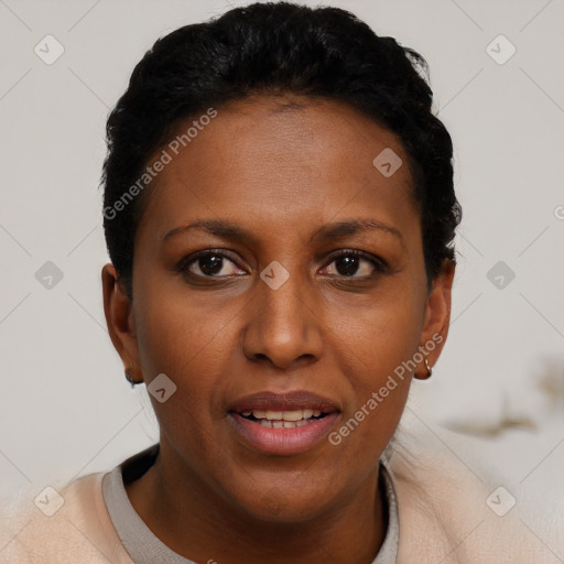 Joyful black young-adult female with short  brown hair and brown eyes
