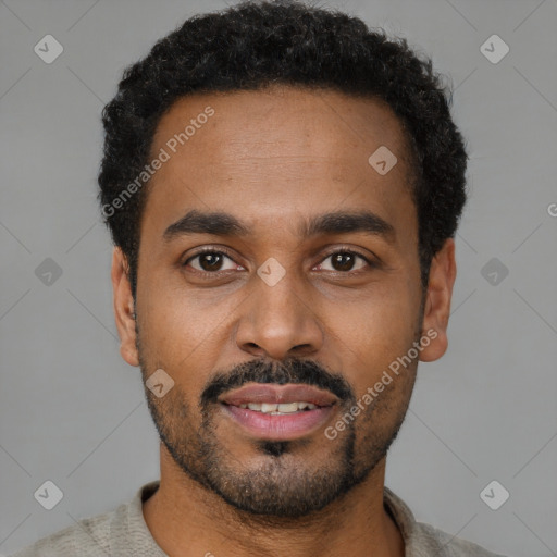 Neutral latino young-adult male with short  black hair and brown eyes
