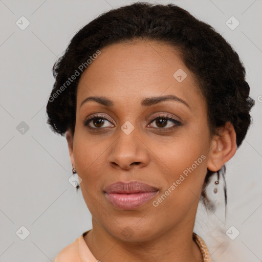 Joyful black young-adult female with medium  brown hair and brown eyes