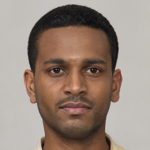 Neutral latino young-adult male with short  brown hair and brown eyes