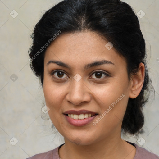 Joyful latino young-adult female with medium  brown hair and brown eyes