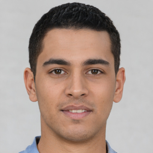 Neutral latino young-adult male with short  brown hair and brown eyes