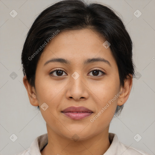 Joyful latino young-adult female with medium  brown hair and brown eyes