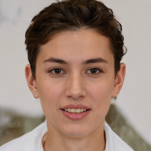 Joyful white young-adult female with short  brown hair and brown eyes