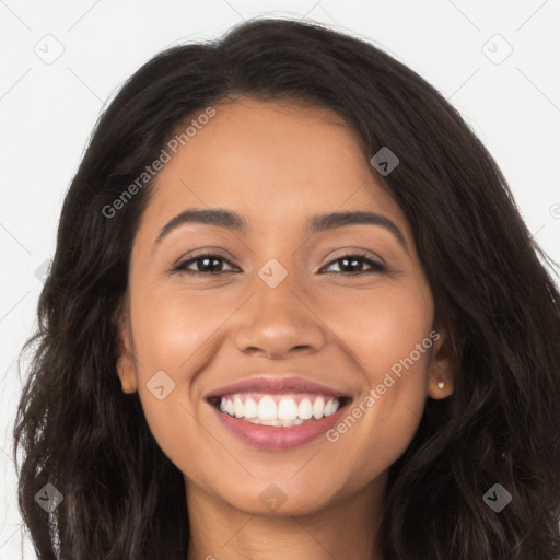 Joyful latino young-adult female with long  brown hair and brown eyes