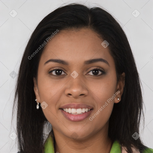 Joyful black young-adult female with long  brown hair and brown eyes