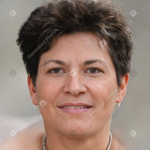 Joyful white adult female with short  brown hair and brown eyes