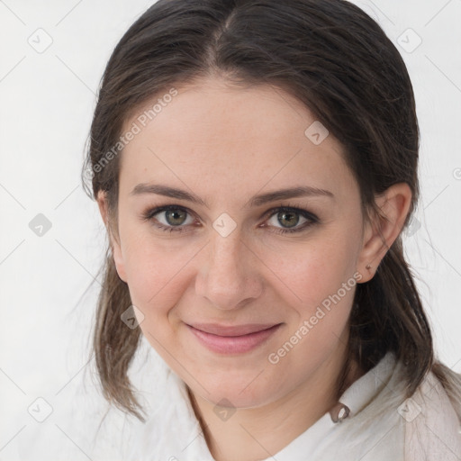 Joyful white young-adult female with medium  brown hair and grey eyes