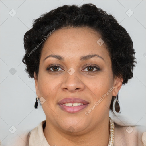 Joyful black adult female with short  brown hair and brown eyes
