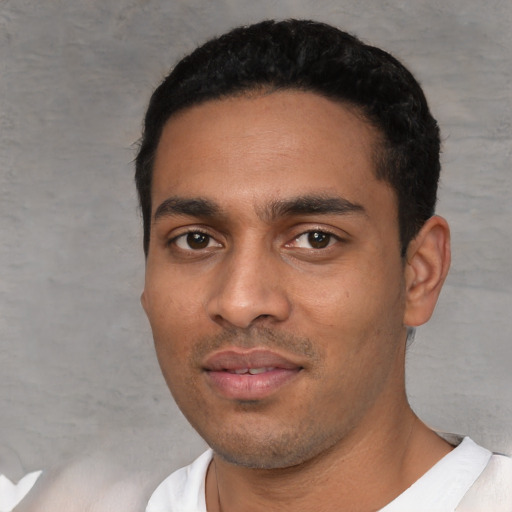 Neutral white young-adult male with short  black hair and brown eyes