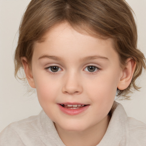 Joyful white child female with medium  brown hair and brown eyes