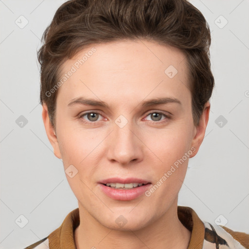 Joyful white young-adult female with short  brown hair and grey eyes