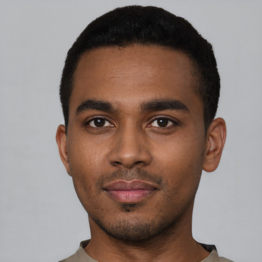 Neutral black young-adult male with short  black hair and brown eyes