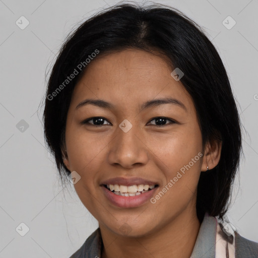 Joyful asian young-adult female with medium  black hair and brown eyes