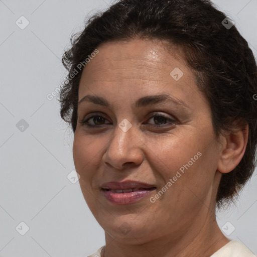 Joyful white adult female with short  brown hair and brown eyes