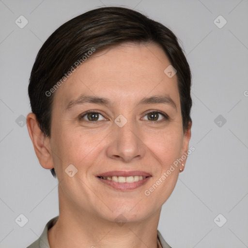 Joyful white young-adult female with short  brown hair and grey eyes