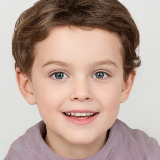 Joyful white child female with short  brown hair and grey eyes