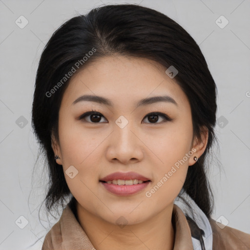 Joyful asian young-adult female with medium  black hair and brown eyes