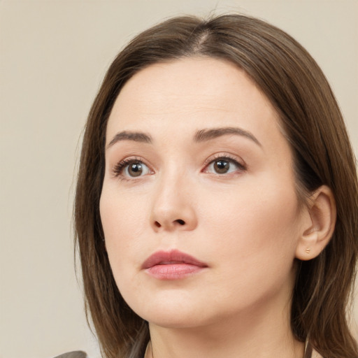 Neutral white young-adult female with medium  brown hair and brown eyes