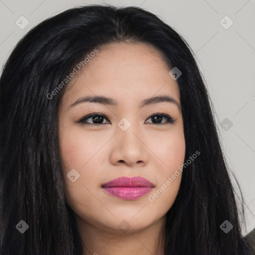 Joyful asian young-adult female with long  black hair and brown eyes