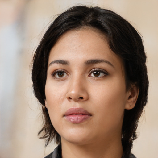 Neutral white young-adult female with medium  black hair and brown eyes