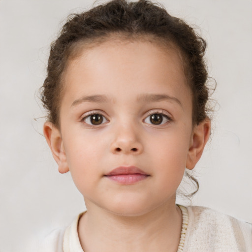 Neutral white child female with short  brown hair and brown eyes