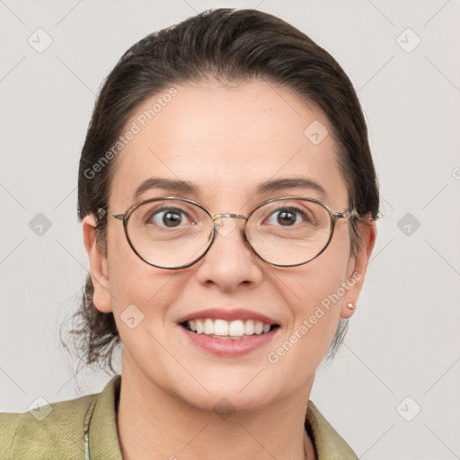 Joyful white adult female with medium  brown hair and grey eyes