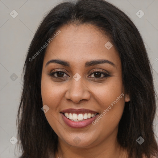 Joyful latino young-adult female with long  brown hair and brown eyes