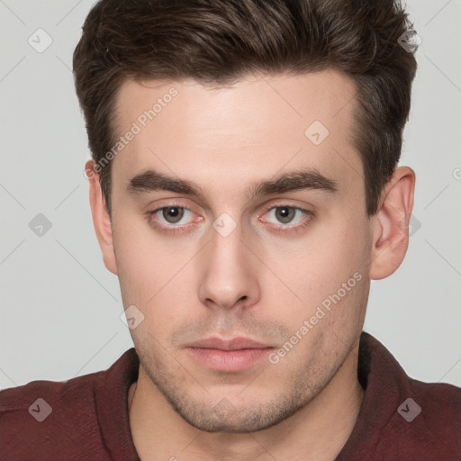 Neutral white young-adult male with short  brown hair and brown eyes