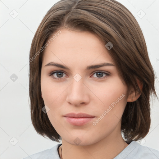 Neutral white young-adult female with medium  brown hair and brown eyes