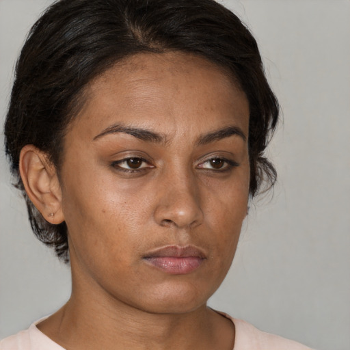 Neutral asian young-adult female with medium  brown hair and brown eyes