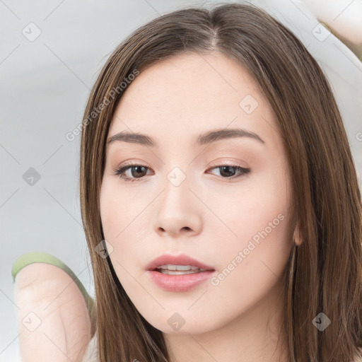 Neutral white young-adult female with long  brown hair and brown eyes