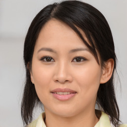 Joyful asian young-adult female with medium  brown hair and brown eyes