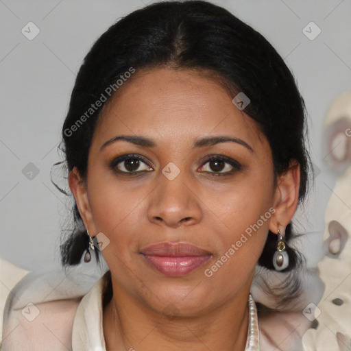 Joyful black adult female with medium  brown hair and brown eyes