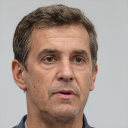 Neutral white adult male with short  brown hair and brown eyes