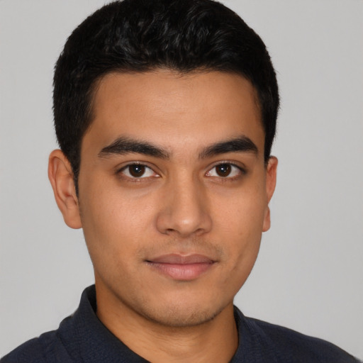 Neutral latino young-adult male with short  brown hair and brown eyes