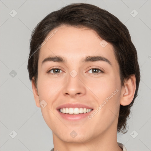 Joyful white young-adult female with short  brown hair and brown eyes