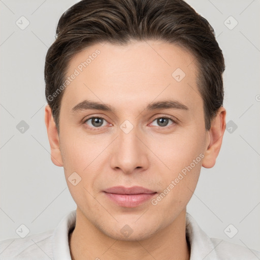 Joyful white young-adult male with short  brown hair and brown eyes