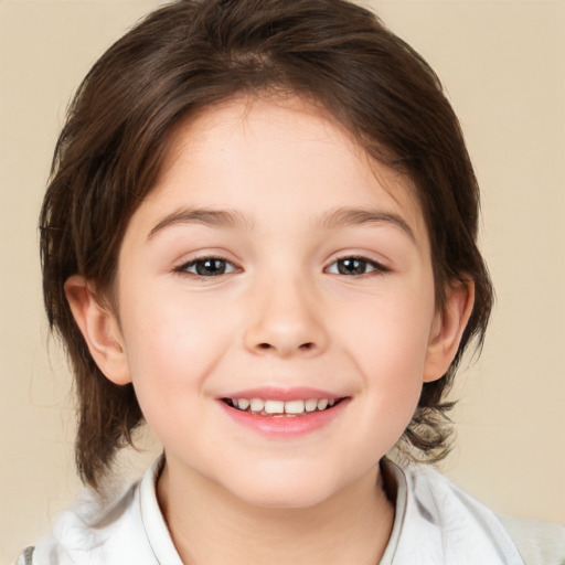 Joyful white child female with medium  brown hair and brown eyes