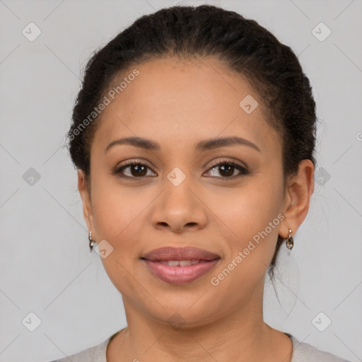 Joyful latino young-adult female with short  brown hair and brown eyes