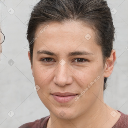 Joyful white young-adult female with short  brown hair and brown eyes