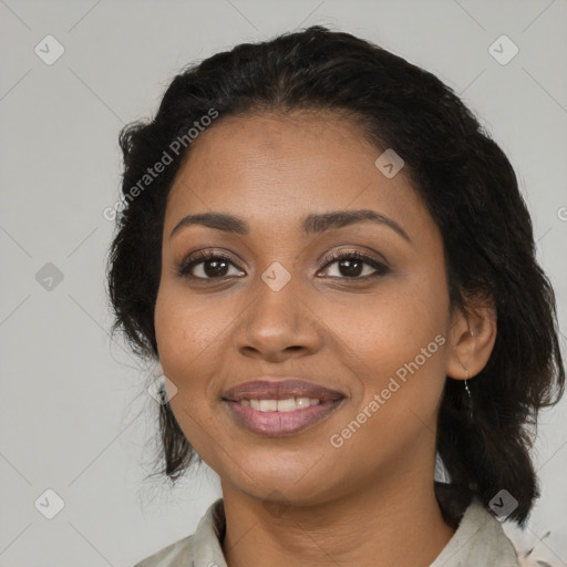 Joyful black young-adult female with medium  black hair and brown eyes