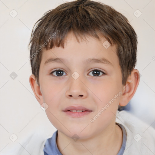 Joyful white child male with short  brown hair and brown eyes